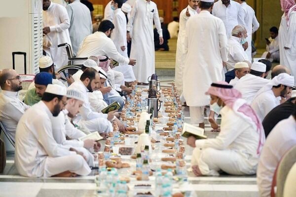Worshippers sharing iftar inside the mosque during Ramadan